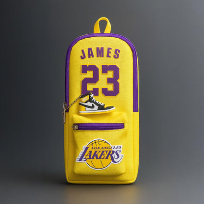 Yellow backpack with 'Los Angeles Lakers' and 'James 23' branding on a gray background